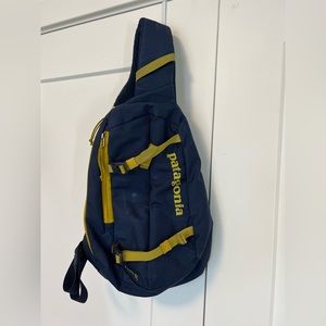 Patagonia Atom Sling 8L shoulder bag navy. Used but in good shape.